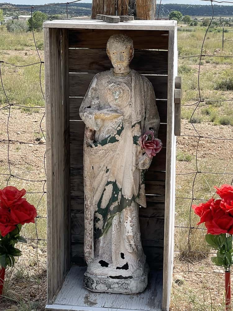 The Santo of St. Joseph at the top rise of the St. Joseph Cemetery in Santa Rosa, NM