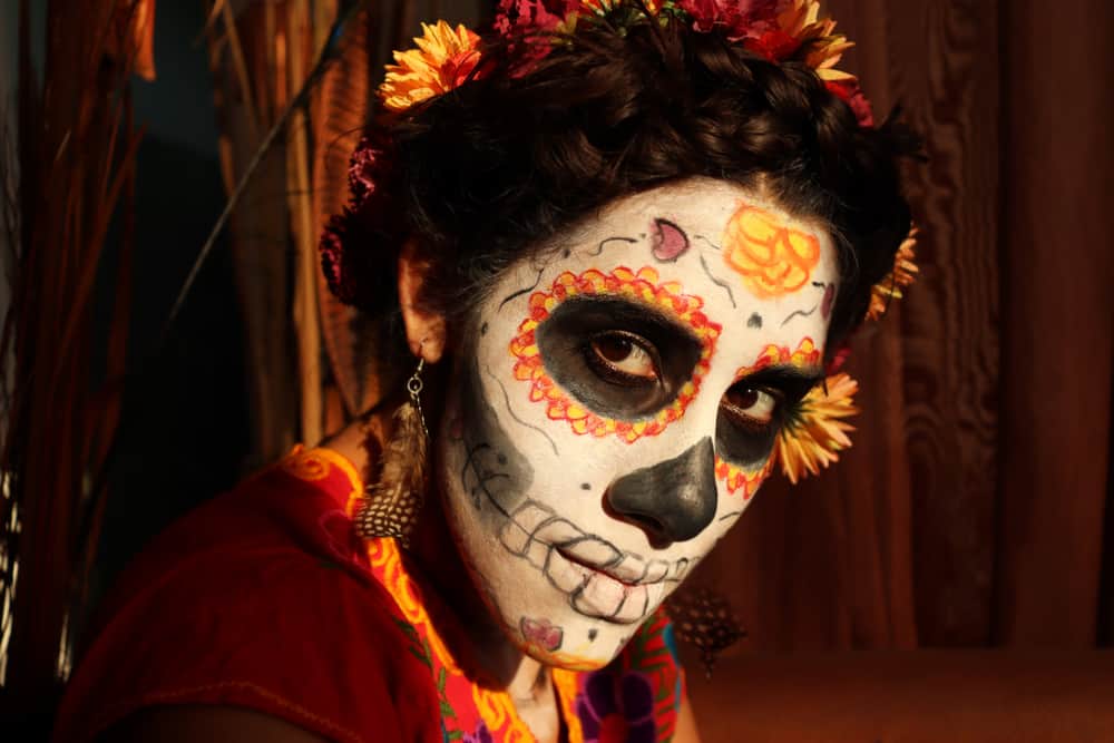 Woman's face painted for Dia de los Muertos