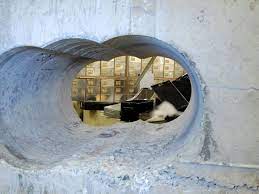 Three holes drilled through a meter of cement to break into the Hatton vaults in London